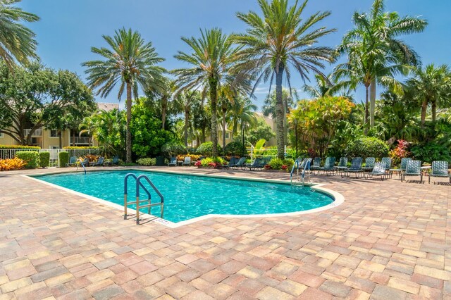 236 Village Blvd Unit 1303, Tequesta, FL 33469 - community pool with a patio area