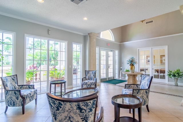 236 Village Blvd Unit 1303, Tequesta, FL 33469 - dining area featuring french doors, light tile patterned floors, a textured ceiling, recessed lighting, and baseboards