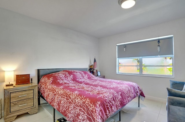 130 Lake Meryl Dr Unit 226, West Palm Beach, FL 33411 - tiled bedroom with baseboards