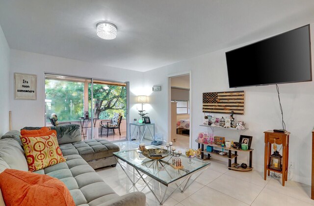 130 Lake Meryl Dr Unit 226, West Palm Beach, FL 33411 - living room featuring light tile patterned flooring