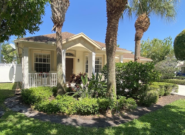 225 Clocktower Dr, Jupiter, FL 33458 - view of front facade with stucco siding