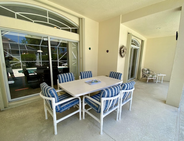 225 Clocktower Dr, Jupiter, FL 33458 - dining space with a textured ceiling