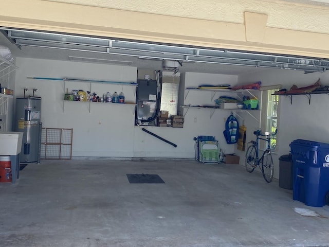 225 Clocktower Dr, Jupiter, FL 33458 - garage with electric water heater and heating unit
