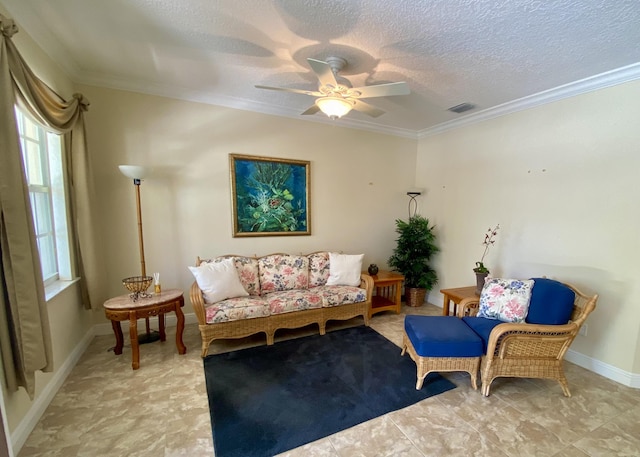 225 Clocktower Dr, Jupiter, FL 33458 - living room featuring crown molding, a ceiling fan, a textured ceiling, and baseboards