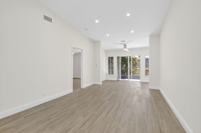 8583 Overset Ln Unit C, Boca Raton, FL 33496 - unfurnished living room featuring light wood-type flooring, recessed lighting, and a ceiling fan