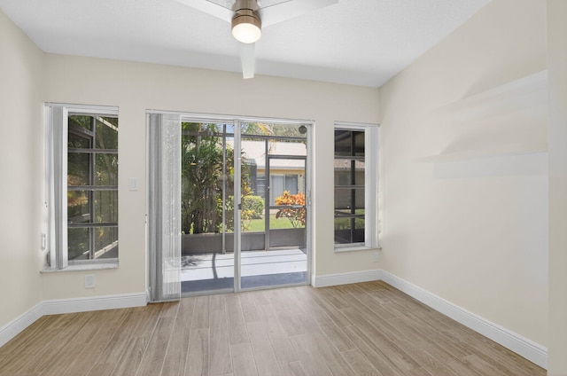 8583 Overset Ln Unit C, Boca Raton, FL 33496 - unfurnished room with wood finished floors and a ceiling fan