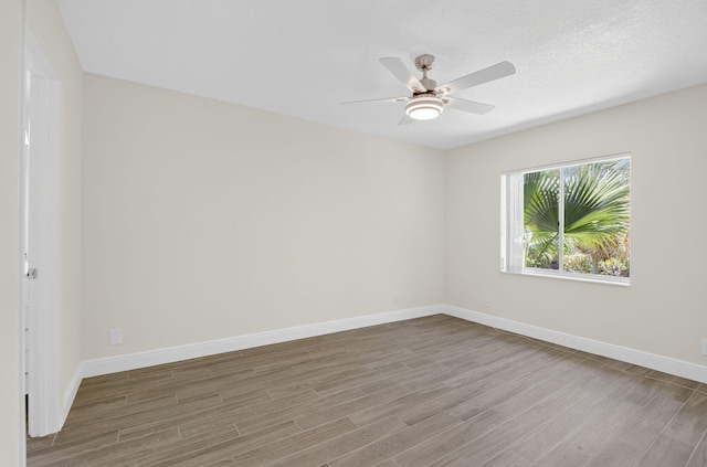 8583 Overset Ln Unit C, Boca Raton, FL 33496 - unfurnished room with wood finished floors and a ceiling fan