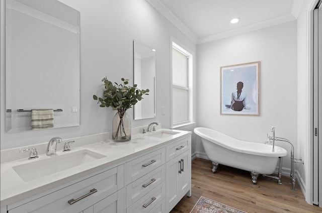 17564 Cinquez Park Rd W, Jupiter, FL 33458 - bathroom with wood finished floors, a soaking tub, recessed lighting, and double vanity