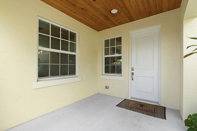 17564 Cinquez Park Rd W, Jupiter, FL 33458 - doorway to property with stucco siding