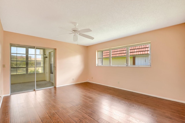 5730 Fernley Dr E Unit 28, West Palm Beach, FL 33415 - unfurnished room with ceiling fan, wood finished floors, and baseboards