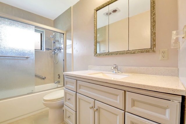 5730 Fernley Dr E Unit 28, West Palm Beach, FL 33415 - bathroom with toilet, vanity, and shower / bath combination with glass door