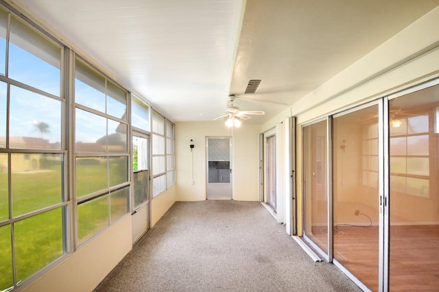 5730 Fernley Dr E Unit 28, West Palm Beach, FL 33415 - unfurnished sunroom with ceiling fan and carpet floors