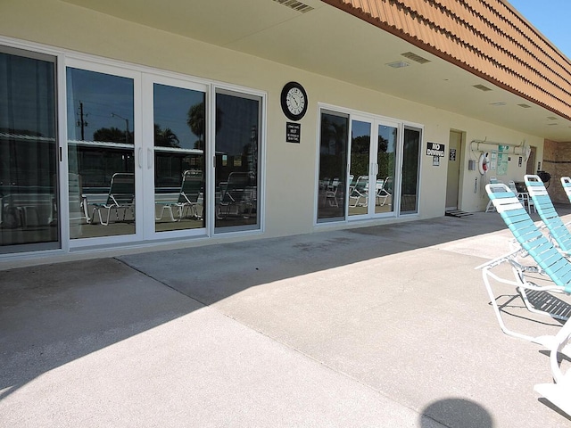 5730 Fernley Dr E Unit 28, West Palm Beach, FL 33415 - view of patio / terrace with french doors