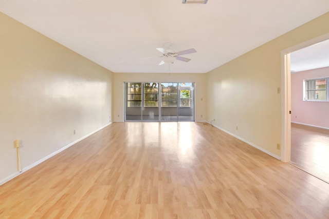 5730 Fernley Dr E Unit 28, West Palm Beach, FL 33415 - unfurnished room featuring a ceiling fan, light wood-style flooring, and baseboards