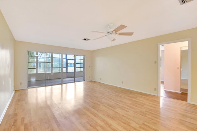 5730 Fernley Dr E Unit 28, West Palm Beach, FL 33415 - spare room featuring light wood-type flooring, ceiling fan, and baseboards