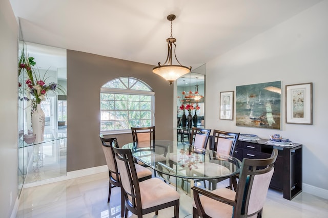 208 Legendary Cir, Palm Beach Gardens, FL 33418 - dining room featuring baseboards and light marble finish floors