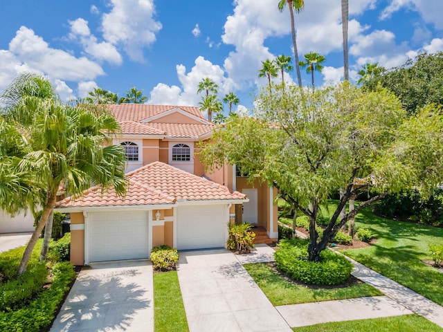 208 Legendary Cir, Palm Beach Gardens, FL 33418 - mediterranean / spanish-style home with a tile roof, stucco siding, driveway, an attached garage, and a front yard