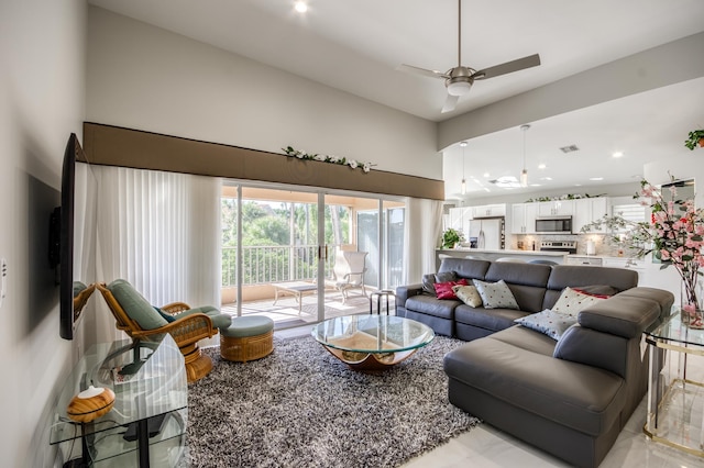 208 Legendary Cir, Palm Beach Gardens, FL 33418 - living area featuring a towering ceiling, a ceiling fan, and recessed lighting