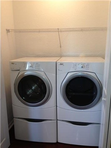 laundry area with washer and dryer