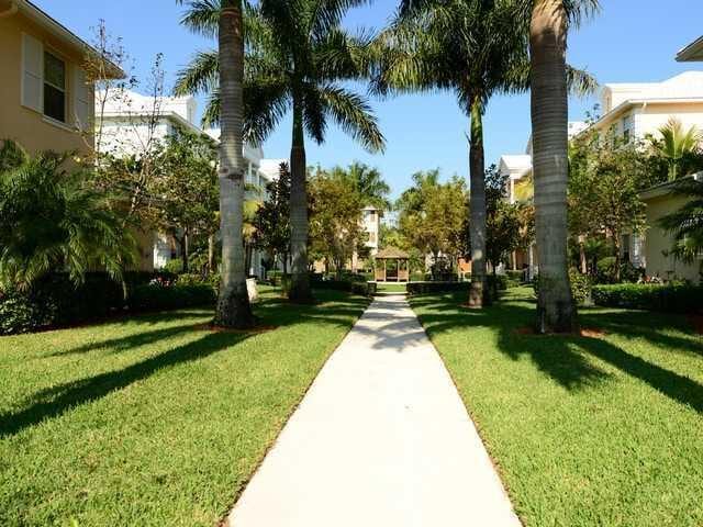 view of community with a lawn