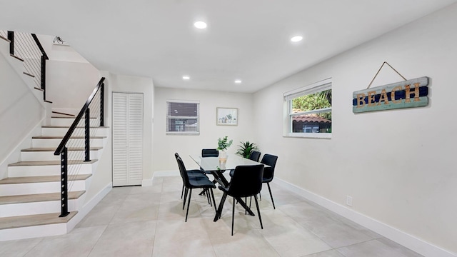 218 NE 10th St, Delray Beach, FL 33444 - dining space featuring recessed lighting, stairway, and baseboards