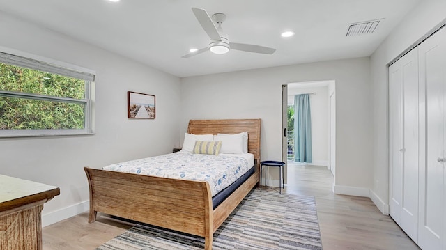218 NE 10th St, Delray Beach, FL 33444 - bedroom featuring recessed lighting, baseboards, light wood finished floors, a closet, and ceiling fan