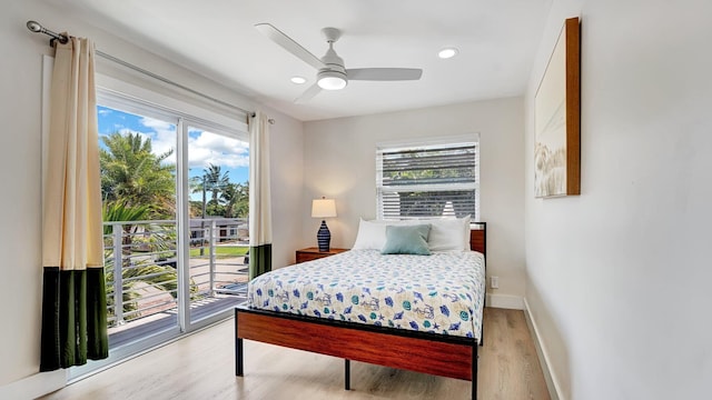 218 NE 10th St, Delray Beach, FL 33444 - bedroom featuring light wood-style floors, access to outside, a ceiling fan, baseboards, and recessed lighting