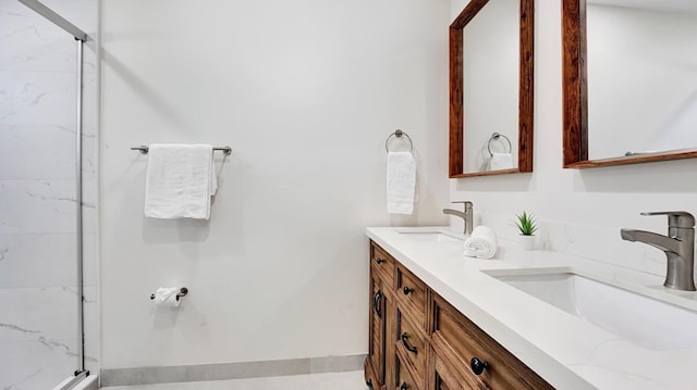 218 NE 10th St, Delray Beach, FL 33444 - bathroom featuring a marble finish shower and double vanity