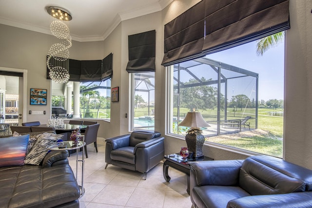 living room featuring light tile patterned flooring, crown molding, a textured wall, a sunroom, and a chandelier