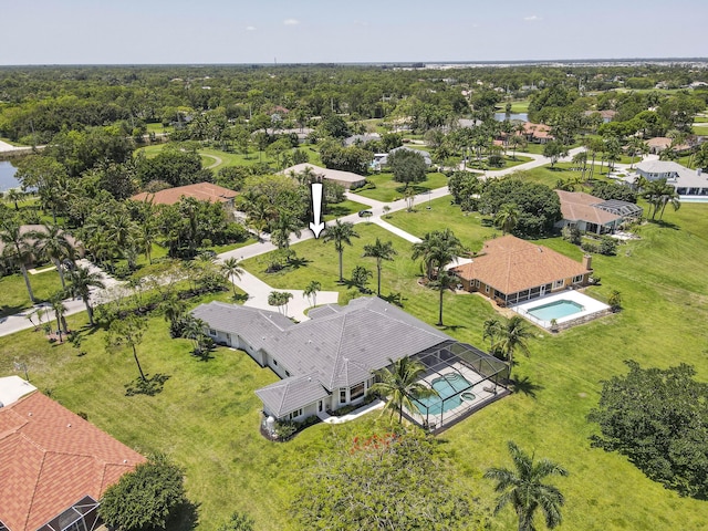 aerial perspective of suburban area with a pool