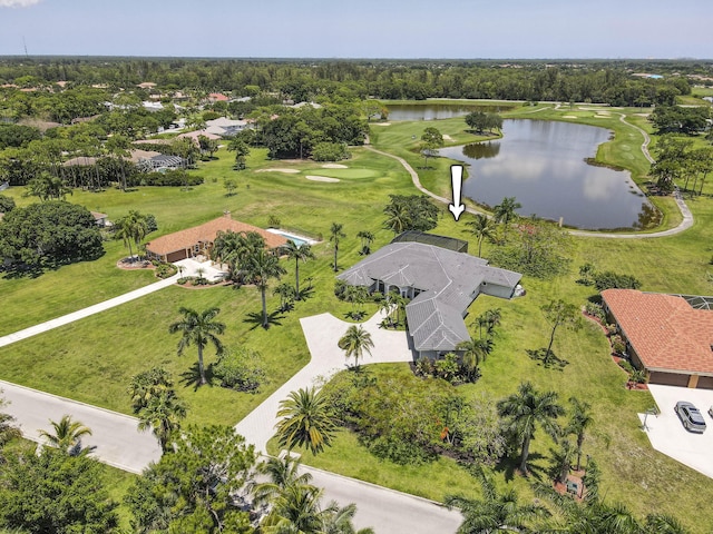 aerial perspective of suburban area with a large body of water and a golf club