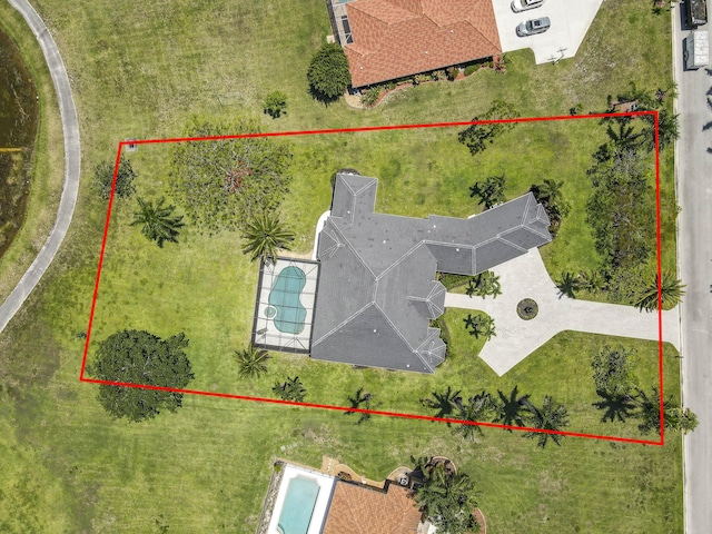 aerial view of property's location with a pool and property boundaries highlighted
