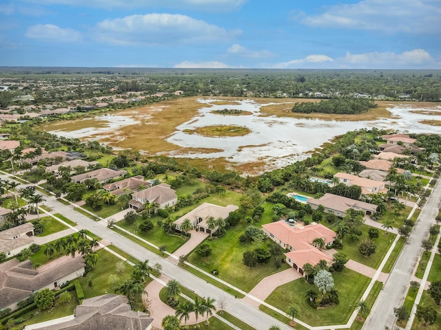 aerial view of property's location with nearby suburban area