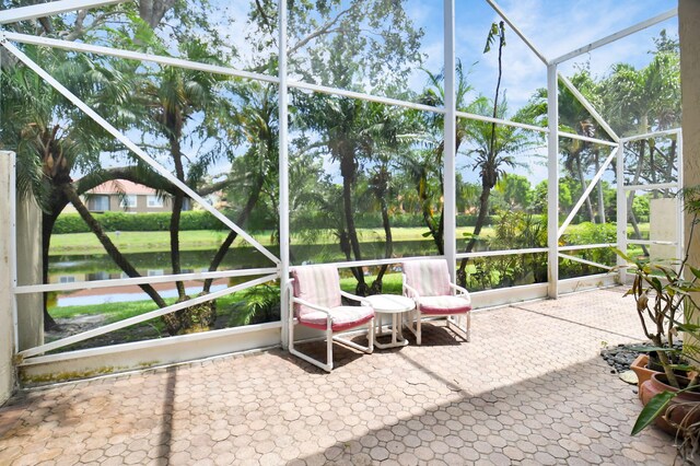 15470 Fiorenza Cir, Delray Beach, FL 33446 - sunroom featuring a water view