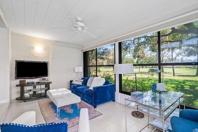 65 Eastgate Dr Unit B, Boynton Beach, FL 33436 - living room with healthy amount of natural light, light tile patterned floors, and a ceiling fan