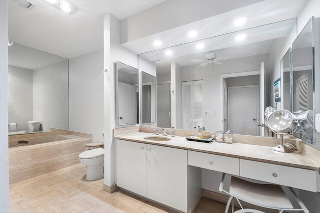 65 Eastgate Dr Unit B, Boynton Beach, FL 33436 - bathroom with toilet, a bath, vanity, a ceiling fan, and tile patterned floors