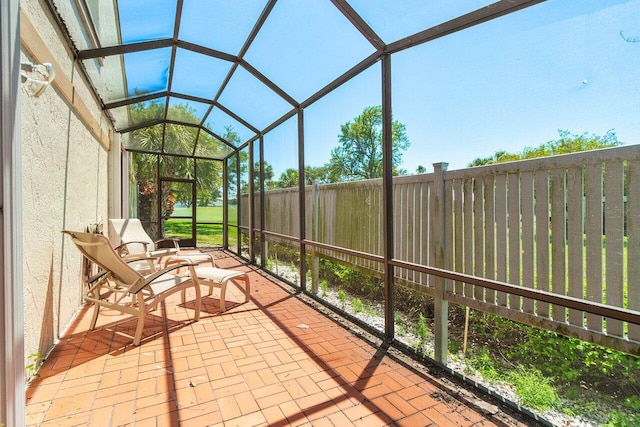 65 Eastgate Dr Unit B, Boynton Beach, FL 33436 - unfurnished sunroom with lofted ceiling