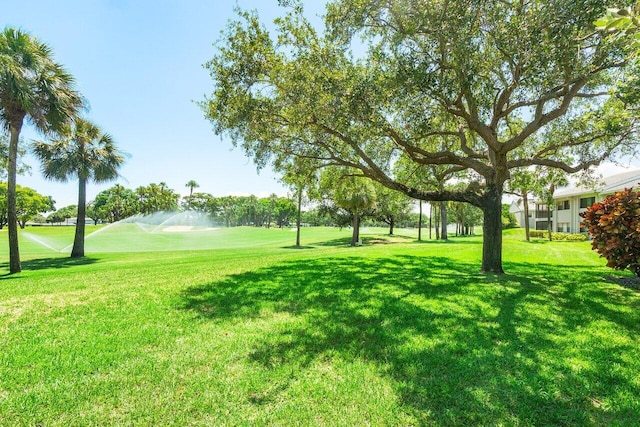 65 Eastgate Dr Unit B, Boynton Beach, FL 33436 - surrounding community featuring a yard