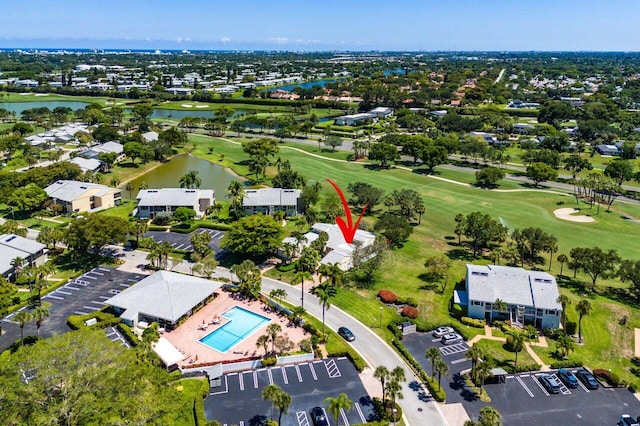 65 Eastgate Dr Unit B, Boynton Beach, FL 33436 - view of property location with a golf course, a large body of water, a pool, and nearby suburban area