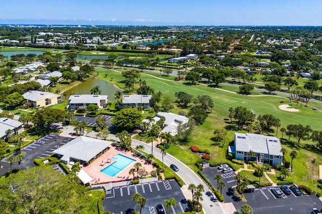 65 Eastgate Dr Unit B, Boynton Beach, FL 33436 - aerial perspective of suburban area featuring a local golf course, a large body of water, and a pool