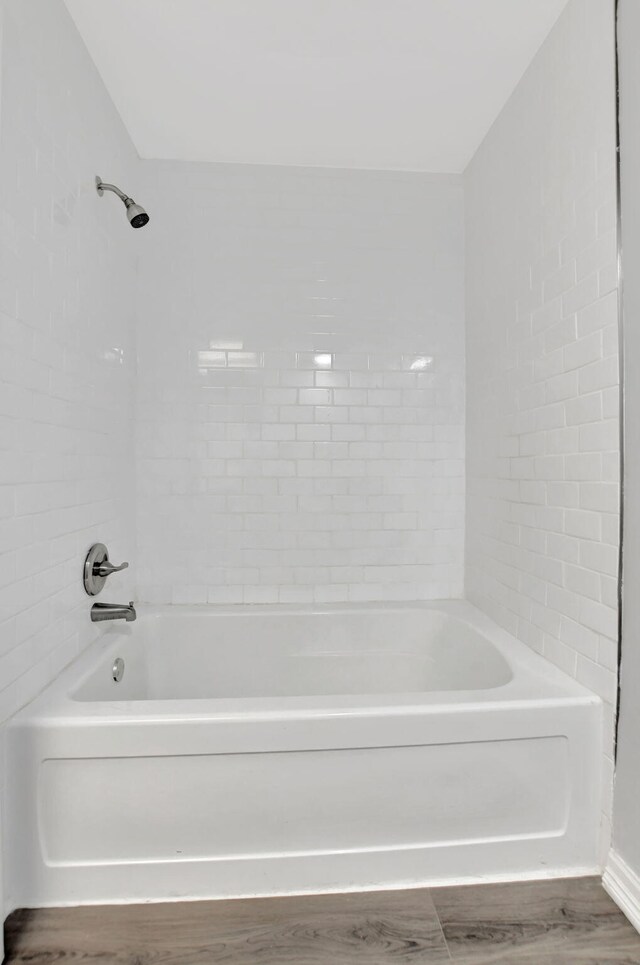 5640 Coach House Cir Unit C, Boca Raton, FL 33486 - full bathroom featuring wood finished floors and washtub / shower combination