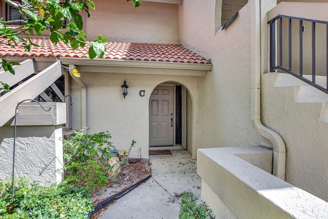 5640 Coach House Cir Unit C, Boca Raton, FL 33486 - entrance to property with stucco siding and a tiled roof