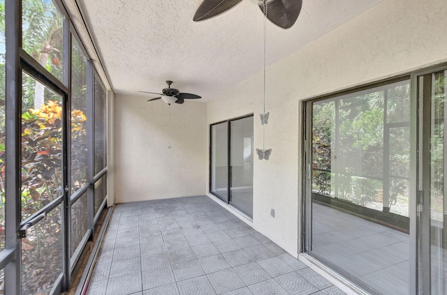 5640 Coach House Cir Unit C, Boca Raton, FL 33486 - unfurnished sunroom featuring a ceiling fan
