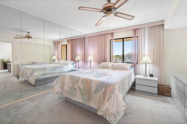 1401 Tidal Pointe Blvd Unit 405, Jupiter, FL 33477 - carpeted bedroom with a textured ceiling
