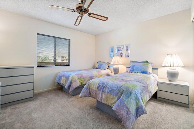 1401 Tidal Pointe Blvd Unit 405, Jupiter, FL 33477 - bedroom with carpet, a textured ceiling, a ceiling fan, and baseboards