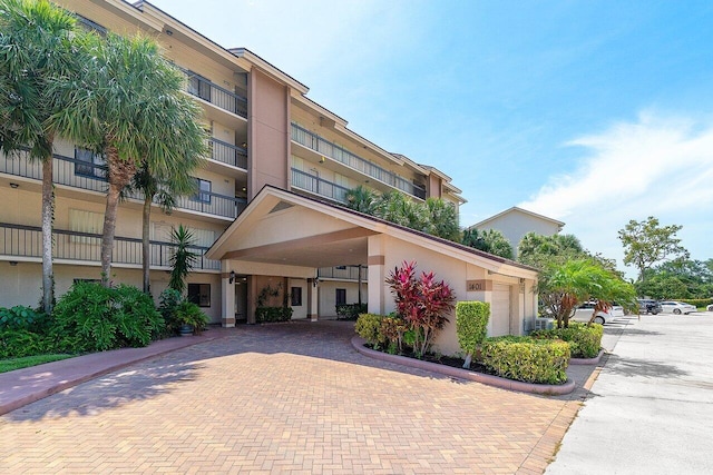1401 Tidal Pointe Blvd Unit 405, Jupiter, FL 33477 - view of property with decorative driveway