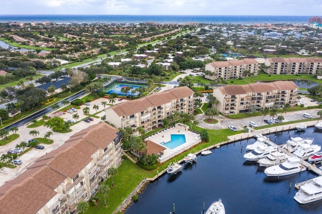 1401 Tidal Pointe Blvd Unit 405, Jupiter, FL 33477 - aerial view of property and surrounding area with a large body of water, apartment complex, and a pool area
