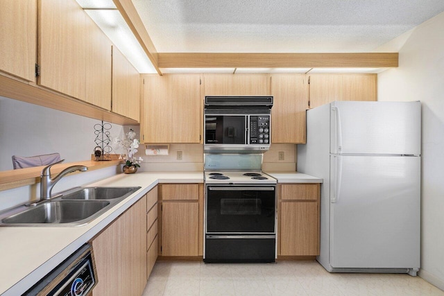 1401 Tidal Pointe Blvd Unit 405, Jupiter, FL 33477 - kitchen with freestanding refrigerator, black microwave, a sink, range with electric stovetop, and dishwasher