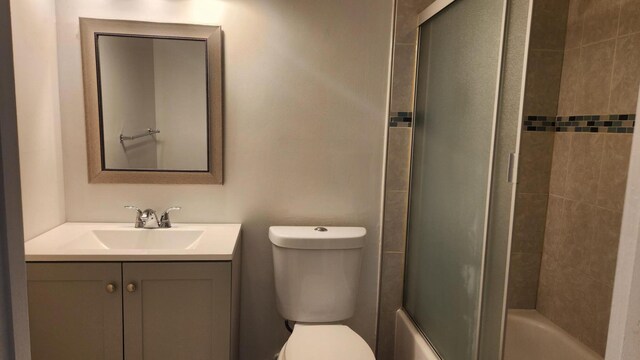 164 Meadows Dr, Boynton Beach, FL 33436 - bathroom featuring vanity and bath / shower combo with glass door