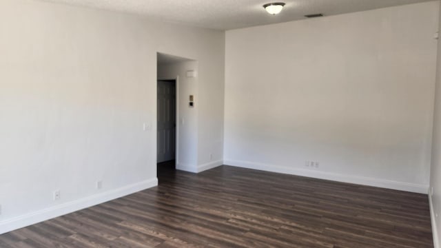 164 Meadows Dr, Boynton Beach, FL 33436 - spare room with dark wood-style flooring and baseboards